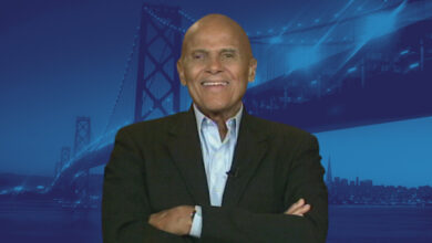 Harry Belafonte with blue bridge background