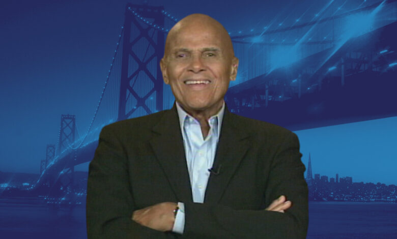 Harry Belafonte with blue bridge background