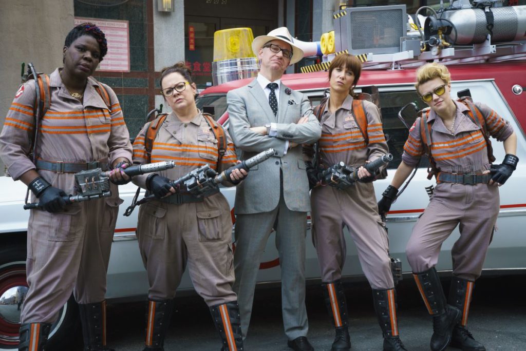 Director Paul Feig poses with the Ghostbusters in front of the Ecto-1. Patty Tolan (Leslie Jones), Abby Yates (Melissa McCarthy), Erin Gilbert (Kristen Wiig) and Jillian Holtzmann (Kate McKinnon) on the set of Columbia Pictures' GHOSTBUSTERS.