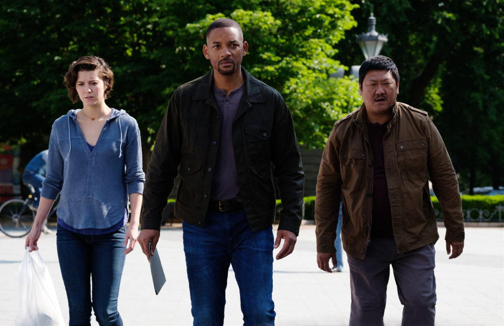 Mary Elizabeth Winstead, Will Smith, and Benedict Wong in a scene from the film