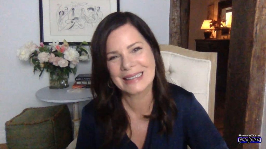 A smiling Marcia Gay Harden