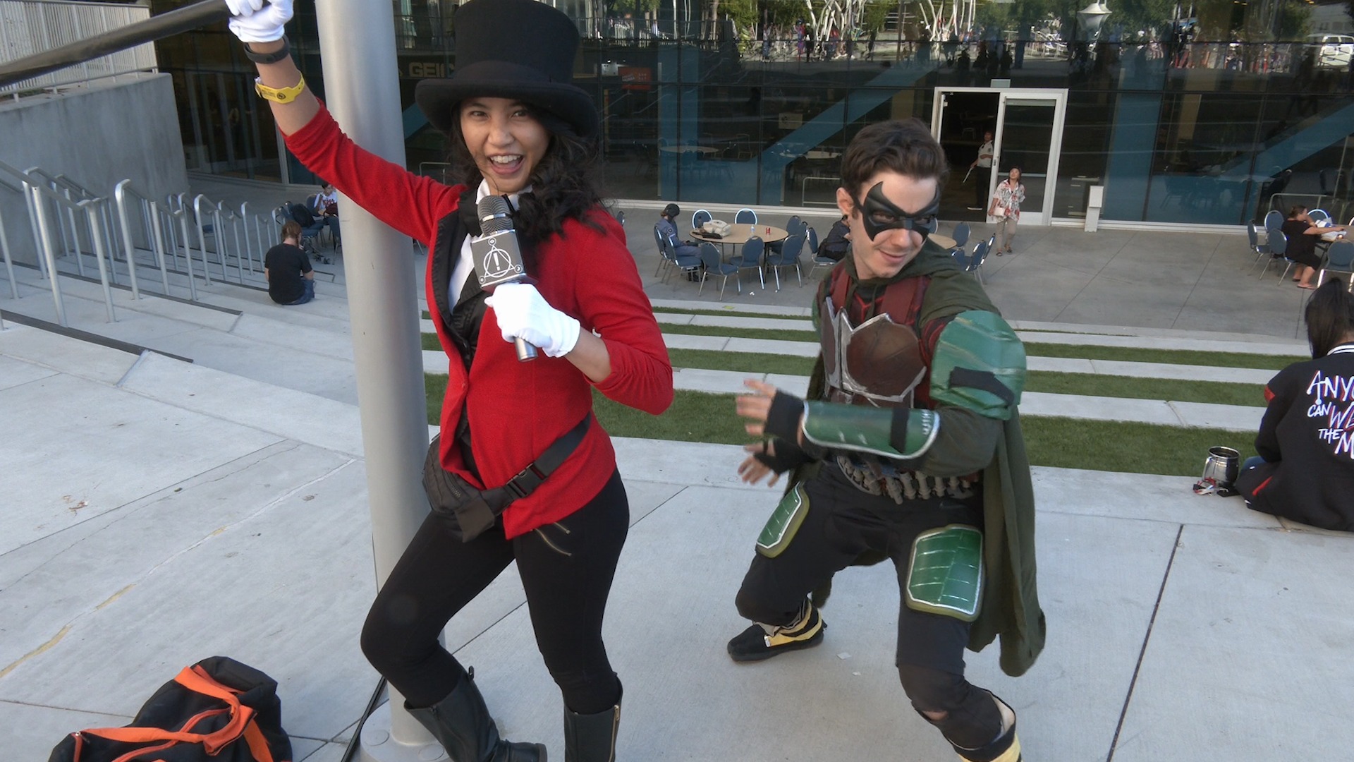 Striking a pose, cosplayers Briore as Brendon Urie from Panic! At The Disco and Danny Black as Robin / Nightwing from "DC's Titans"