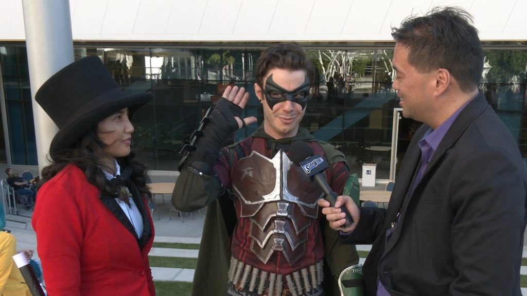 Cosplayers Briore as Brendon Urie from Panic! At The Disco and Danny Black as Robin / Nightwing from "DC's Titans" with host Richard R. Lee