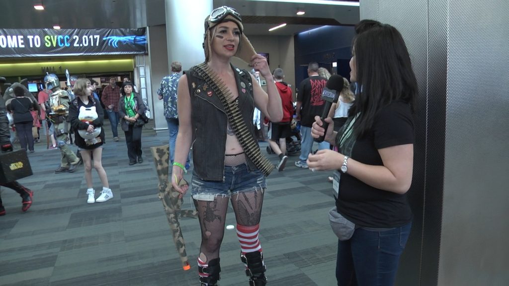 Lori interviews a cosplayer dressed as Tank Girl