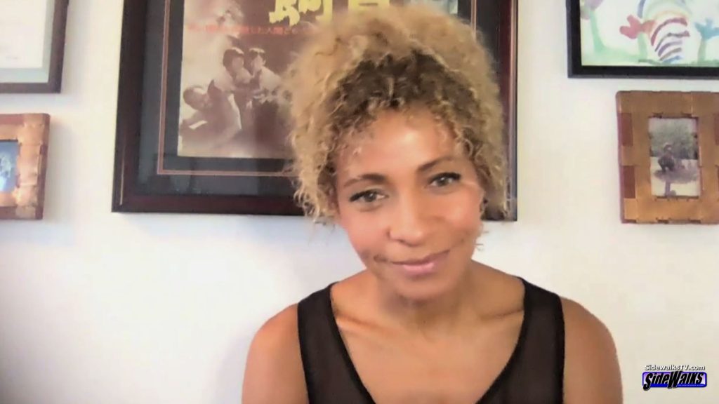 Michelle Hurd listerning