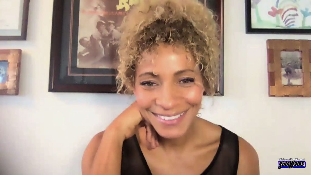 A smiling Michelle Hurd