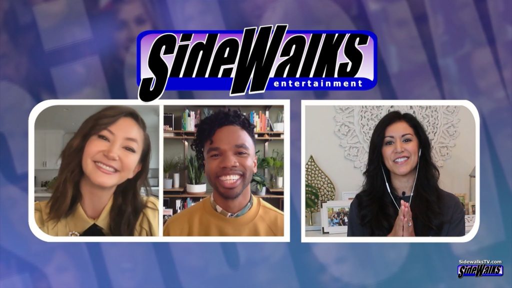 Host Veronica Castro interviews Kimiko Glenn and Luke Youngblood in a three shot