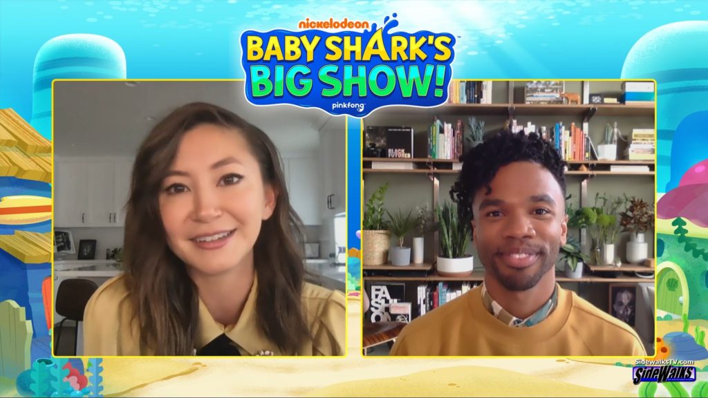 It's Baby Shark and William. The voice actors Kimiko Glenn and Luke Youngblood in a two-shot