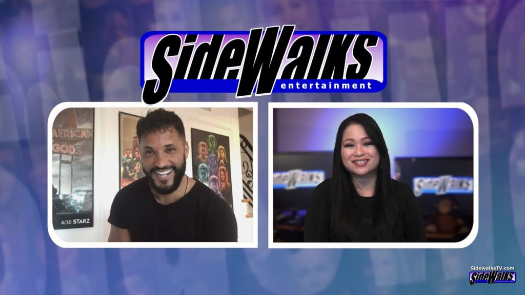 Host Lori Rosales and Ricky Whittle in a two-shot