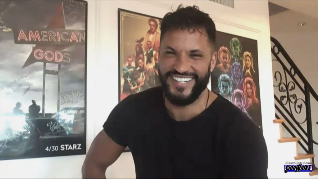 Ricky Whittle smiles