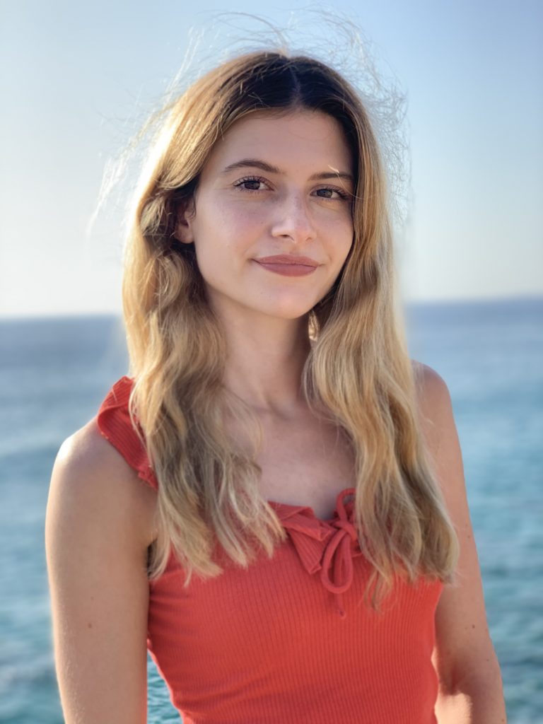 Romina Venturini wearing a red top outdoors