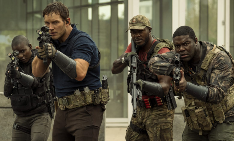 CHRIS PRATT, EDWIN HODGE, and SAM RICHARDSON holding guns facing the aliens in The Tomorrow War