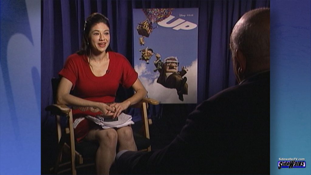 Host Maaika Westen interviews Ed Asner in an over the shoulder shot