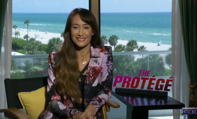 Maggie Q smiles