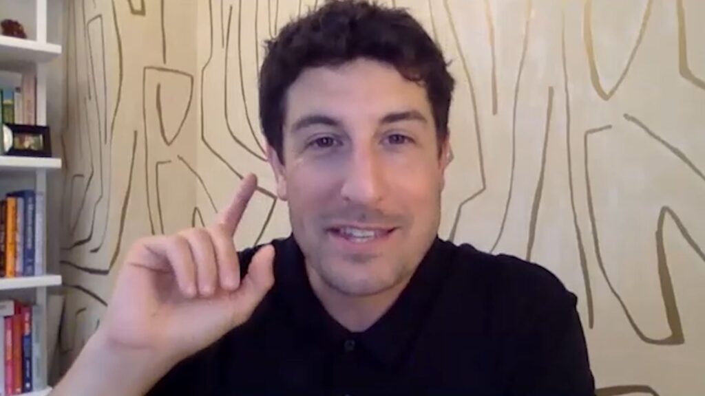 Jason Biggs with his hand up