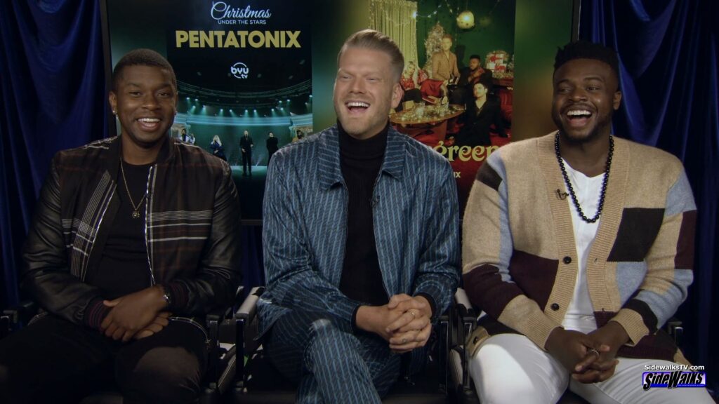 Pentatonix's Matt Sallee, Scott Hoying and Kevin Olusola laugh during our interview in a three person shot