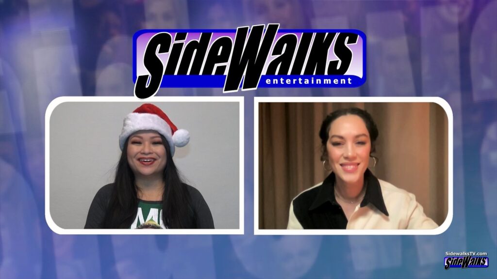 All smiles from Mishel Prada and host Lori Rosales in a two shot