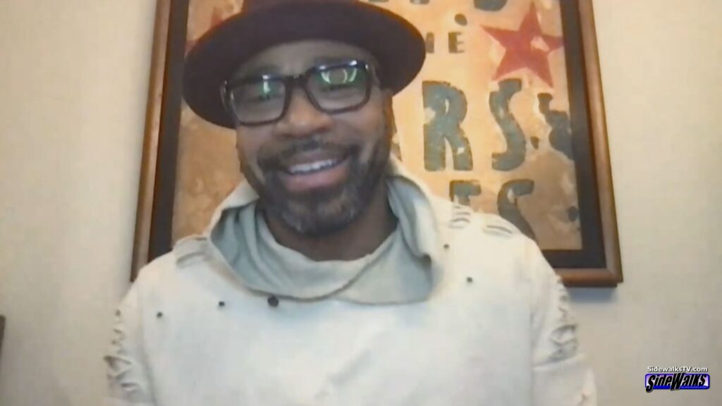 Columbus Short smiles during his interview in a single shot