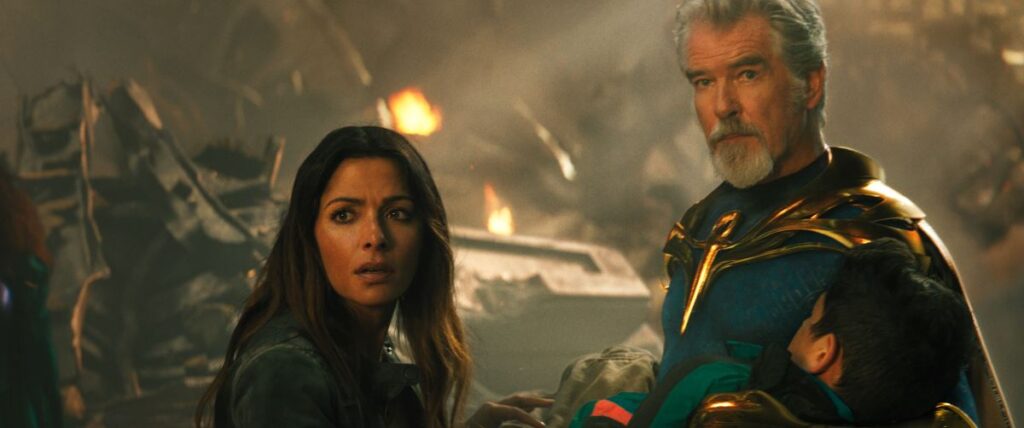 SARAH SHAHI as Adrianna and PIERCE BROSNAN as Dr. Fate