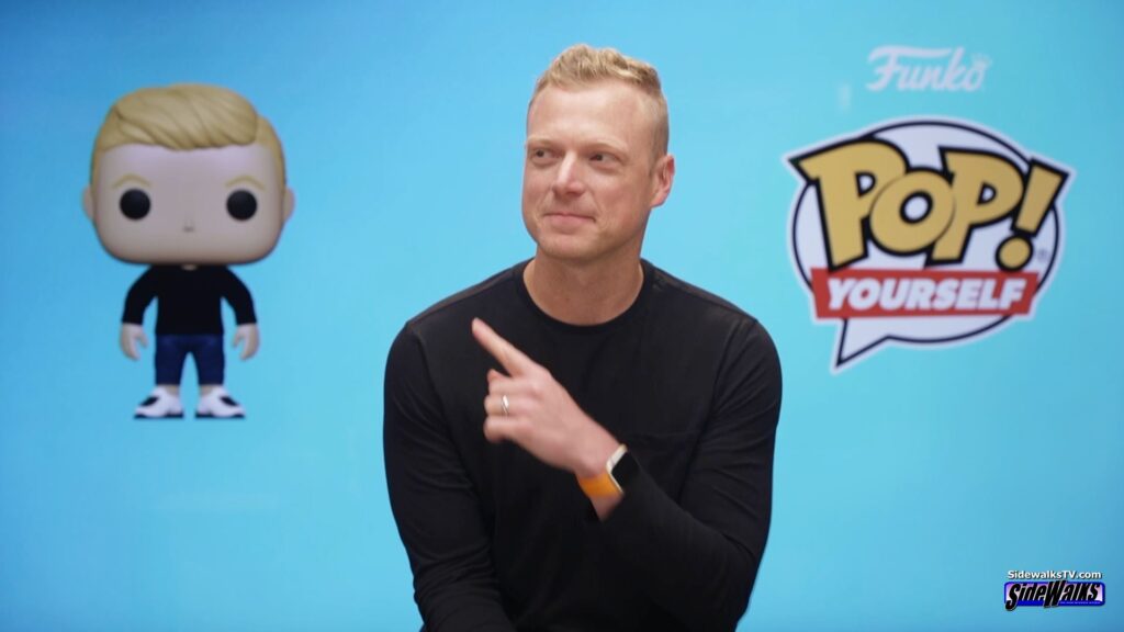 Dave Beré, the Vice President of Brand & Marketing at Funko, points to his Funko’s Pop! Yourself version of himself