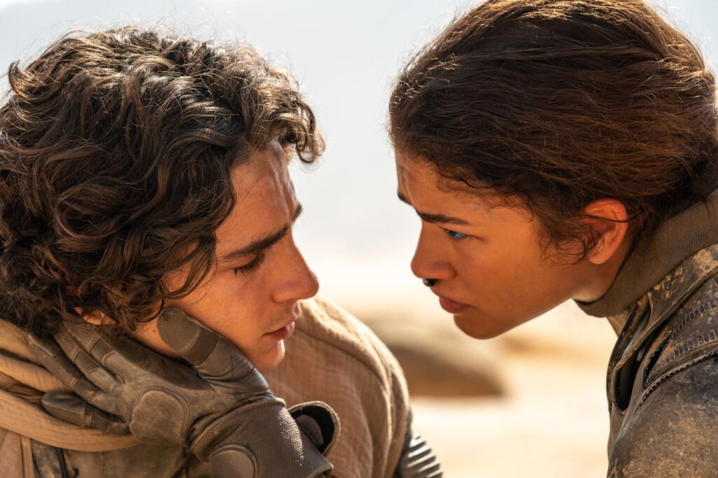 TIMOTHÉE CHALAMET as Paul Atreides and ZENDAYA as Chani