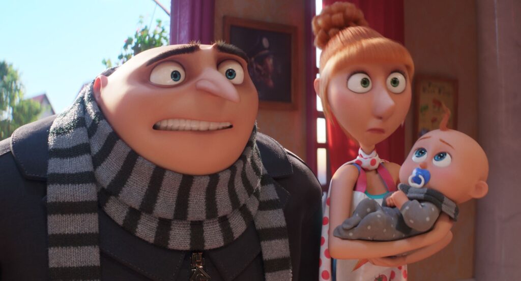 Gru (Steve Carell), Lucy (Kristen Wiig) and Gru Jr.