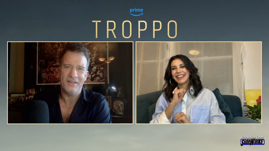 All smiles Thomas Jane and Nicole Chamoun in a two-shot