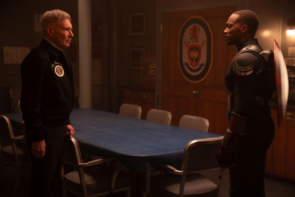 Harrison Ford as President Thaddeus Ross and Anthony Mackie as Sam Wilson/Captain America in film still.